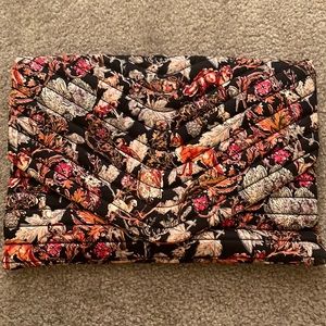 And Other Stories quilted envelope clutch.